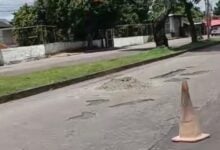 Comerciantes a la acción toman la iniciativa y tapan huecos en la avenida Libertador
