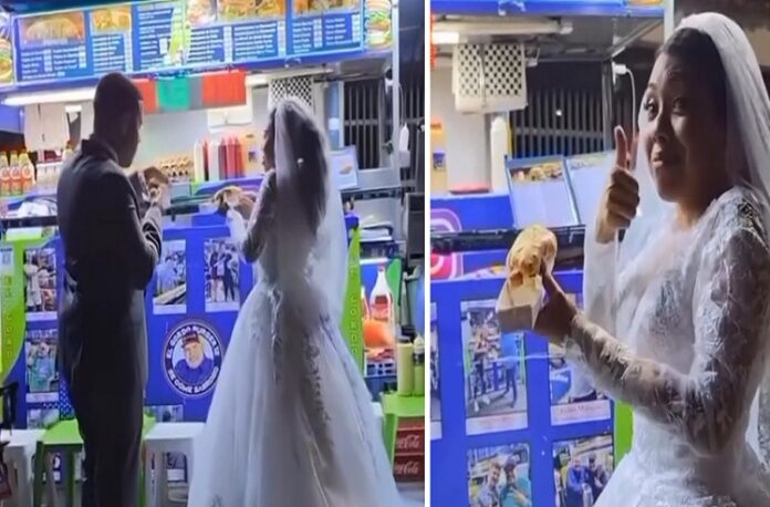 Video de recién casados comiendo perros calientes en la acera se vuelve viral en redes